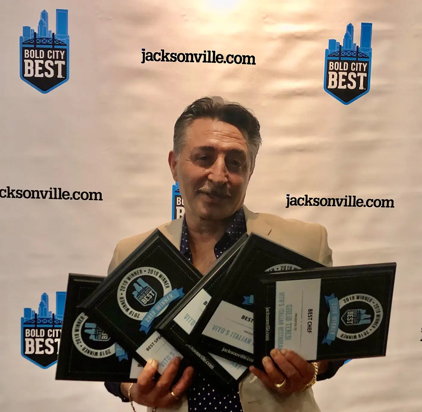 Chef Giulio with his Bold City Best awards