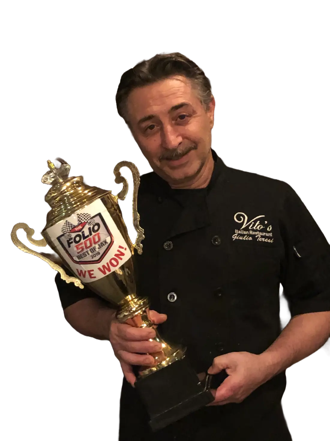 Chef Giulio holding a Folio Weekly award